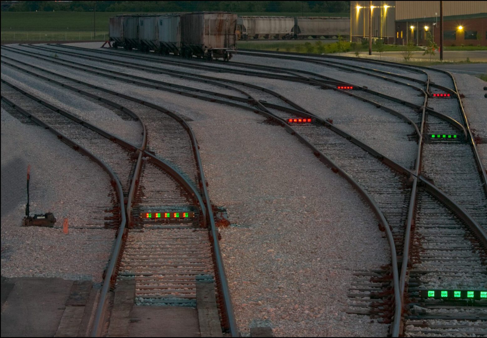 A train track with some lights on it
